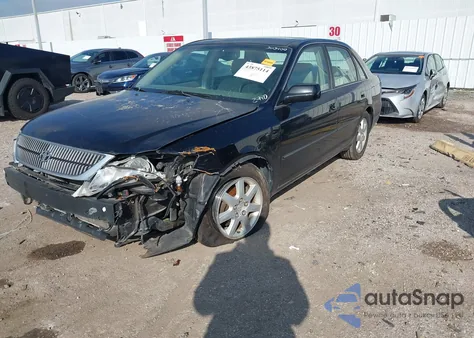 2000 Toyota Avalon Xls z USA, uszkodzony, nr VIN 4T1BF28B4YU022740